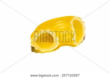 Yellow Pasta Horns On A White Background