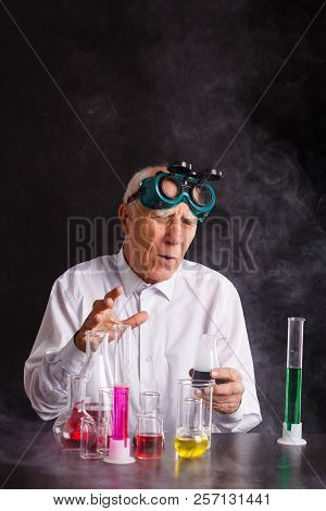 An Old Chemist With Scared Face. Crazy Scientist