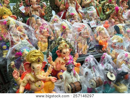 Ganeshotsav- A favorite festive seasn in Maharashtra provide jobs to hundreds of artists, small scale industry and traders. Many handmade status of Ganesha Idol selling in a makeshift shop.