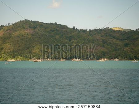 Turquoise Ocean, View On A Tropical Green Island In Bali