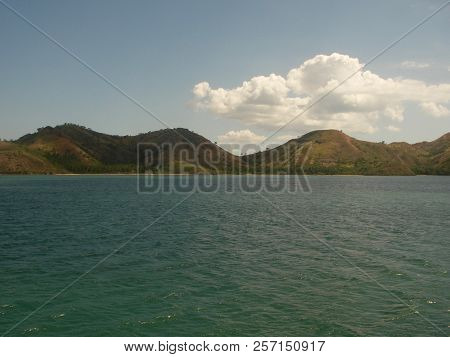 Turquoise Ocean, View On A Tropical Green Island In Bali