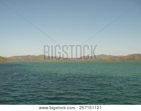Turquoise Ocean, View On A Tropical Green Island In Bali