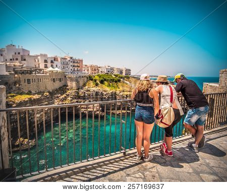 Polignano A Mare, Italy, 13 Jul 2018 - Family Lookj At The Panorama In Polignano A Mare In Italy