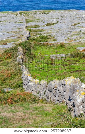 Fanore Beach In Burren Mountain With Stone Walls