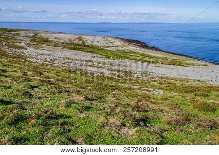 Fanore Beach In Burren Mountain With Aran Islands In Background
