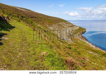 Burren Way Trail With Galway Bay In Background
