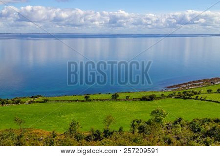 Farms In Burren Way Trail With Galway Bay In Background