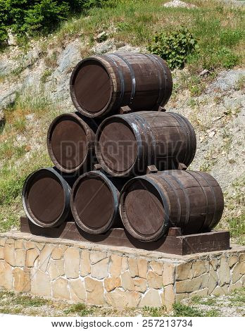Advertising Design From Old Oak Barrels On The Edge Of Vineyards And Winery. Countryside Of Russia A