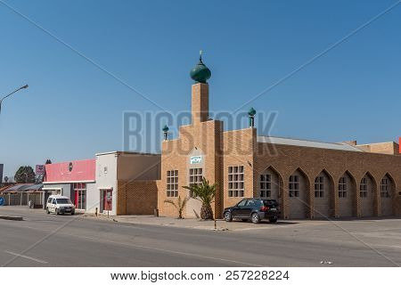 Kroonstad. South Africa, July 30, 2018: A Street Scene, With The Musjid-e-bilal, In Kroonstad, A Tow