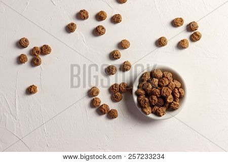 Tigernuts / Earth Almonds / Nutsedges In A Small Bowl, On White Surface, Top View