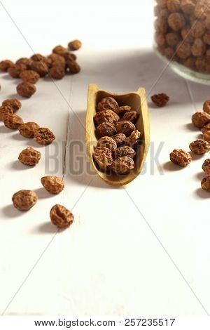 Tigernuts / Earth Almonds / Nutsedges On White Surface