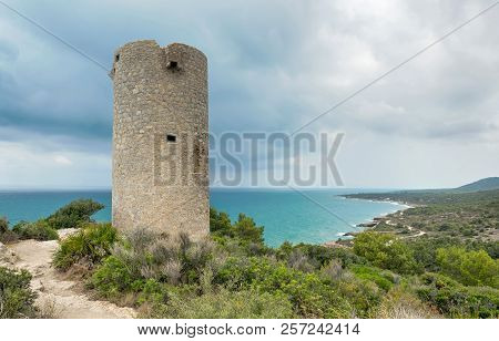 Watchtower On The Cliff In The Sea. Sierra De Irta In Peniscola. Castellon. Spain.