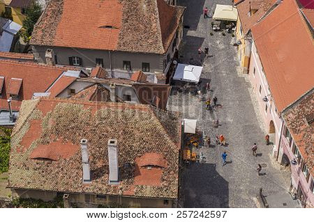 Sibiu, Romania - July 30, 2018: High Angle General View Of Rooftops And Town Street In Sibiu, Transy