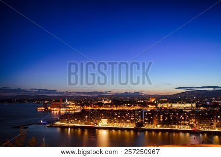 Oslo night cityscape as viewed from the Ekeberg hill, Norway, Scandanavia