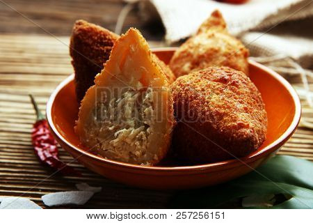 Coxinha Street Food. Brazilian Chicken Coxinha Over Rustic Background.