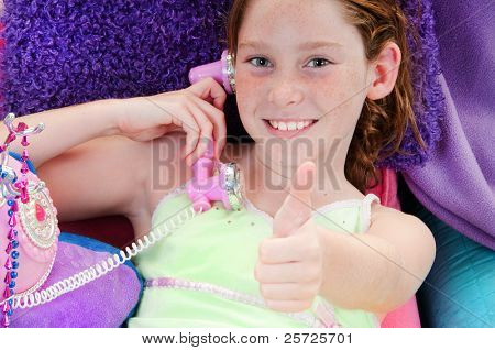 girl getting good news on phonecall