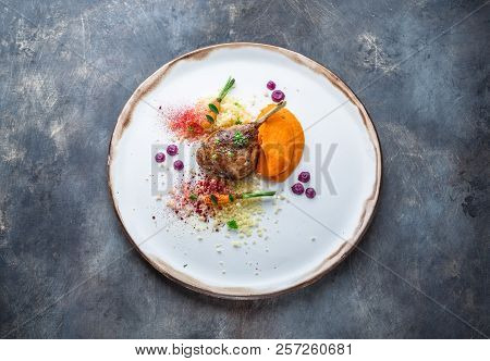 Duck Leg Confit With Batat Puree, Carrots And Couscous, Restaurant Meal