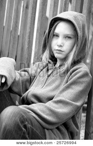 girl in hooded jacket outside