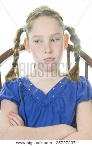 young girl upset in chair