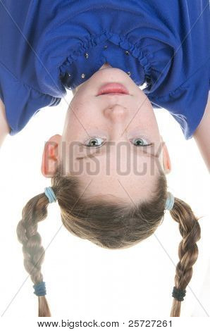 silly girl hanging upside down