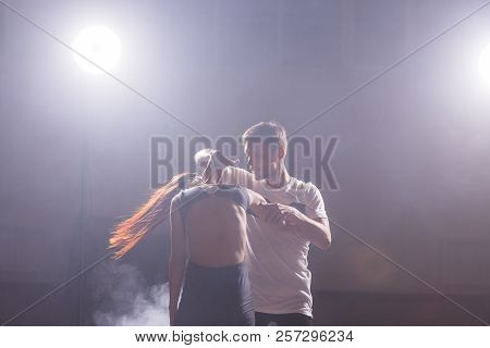 Young Couple Dancing Social Danse Kizomba Or Bachata Or Semba Or Taraxia In Dancing Class Background