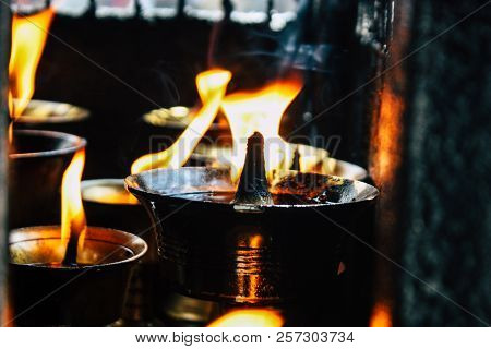 Kathmandu Nepal September 1, 2018 Closeup Of Candles Burning Front A Temple At Durbar Square In Kath