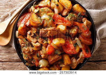 Georgian Traditional Recipe Ojahuri With Pork And Potatoes Close-up. Horizontal Top View