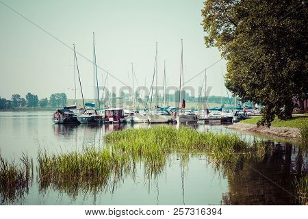 Ryn, Warmia-masuria Province / Poland - July 31, 2018: Marina And Pier On Rynskie Lake, Town Of Ryn.
