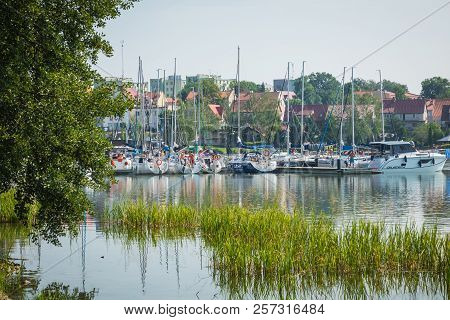 Ryn, Warmia-masuria Province / Poland - July 31, 2018: Marina And Pier On Rynskie Lake, Town Of Ryn.