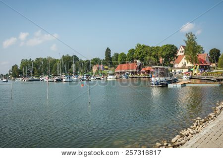 Ryn, Warmia-masuria Province / Poland - July 31, 2018: Marina And Pier On Rynskie Lake, Town Of Ryn.