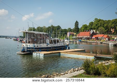 Ryn, Warmia-masuria Province / Poland - July 31, 2018: Marina And Pier On Rynskie Lake, Town Of Ryn.