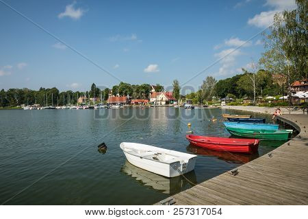 Ryn, Warmia-masuria Province / Poland - July 31, 2018: Marina And Pier On Rynskie Lake, Town Of Ryn.