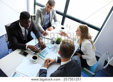 Top View Of Business People Working Together While Spending Time In The Office.
