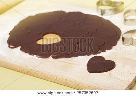 Cooking Process: Uncooked, Heart Shaped Cookies On Baking Papper, Raw Dough And Heart Shaped Cookie 