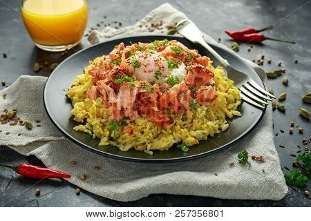Traditional Indian-english Kedgeree Breakfast: Basmati Rice With Egg Benedict And Hot Smoked Sweet C