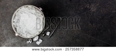 Metal Ice Bucket On A Dark Background