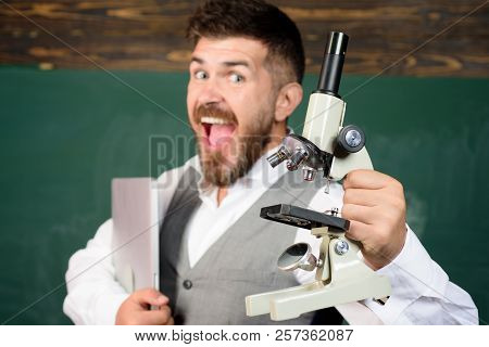 Biology Or Chemistry Concept. Scientist Or Docent With Laptop And Microscope. Happy Bearded Man In S