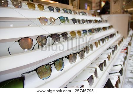 Sun Glasses Choose. Hundred Of Colorful Sun Glasses To Choose From. Sunglasses In Sale.