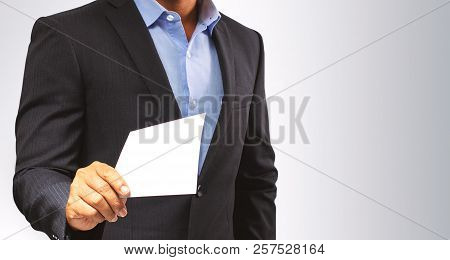 Management Submits An Envelope To Employees. Businessman
