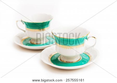 Set Of Dishes On White Background. Green Indian Cups