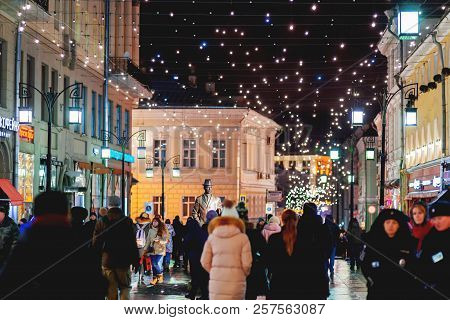 Moscow, Russia - Decembar 24, 2017. People Walking On Streets Of Moscow, Decorated To Celebrate The 