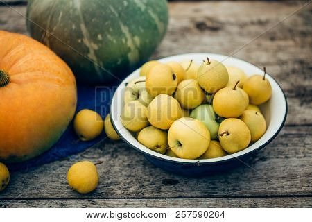 Wood Background With Pumpkin, Pears, Apples, Selective Focus. Vintage Background