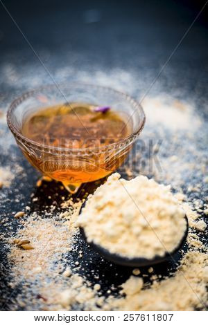 Close Up Of Oats Face Pack I.e. Rose Water,oats,gram Flour And Honey On Wooden Surface Used In Spa F