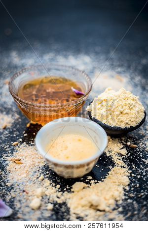 Close Up Of Oats Face Pack I.e. Rose Water,oats,gram Flour And Honey On Wooden Surface Used In Spa F