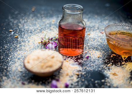Close Up Of Oats Face Pack I.e. Rose Water,oats,gram Flour And Honey On Wooden Surface Used In Spa F