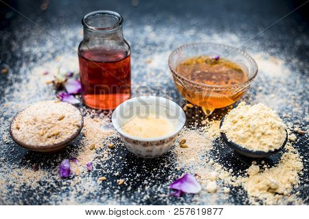 Close Up Of Oats Face Pack I.e. Rose Water,oats,gram Flour And Honey On Wooden Surface Used In Spa F