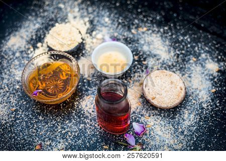 Close Up Of Oats Face Pack I.e. Rose Water,oats,gram Flour And Honey On Wooden Surface Used In Spa F