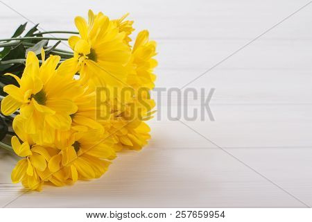 Beautiful Yellow Flowers On White Wooden Background. Close Up. Sunchoke Flowers.