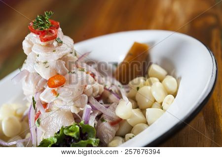 Ceviche, Dish Symbol Of Peruvian Gastronomy. On A Wooden Table.