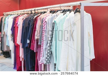 Many Bathrobes Any Colors. Racks And Hangers With Cotton And Bamboo Dressing Gowns. Dressing Gowns O